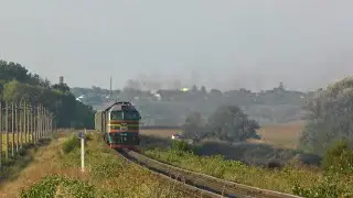 The car fell behind the train and stopped the chase