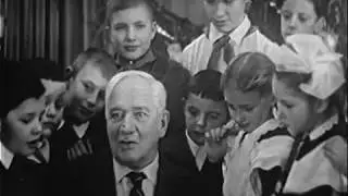 Writer Korney Ivanovich Chukovsky visiting schoolchildren. Russia 1960 year.