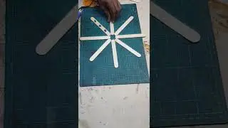 DIY - Wall decoration idea using popsicle sticks. 
