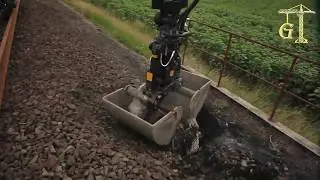 Hem yolda hem rayda gidebilen ekskavatör