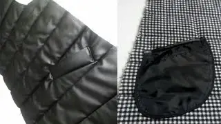 A welt pocket on a quilted faux leather coat.