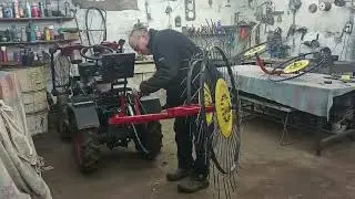 крепим грабли солнышко к мототрактору