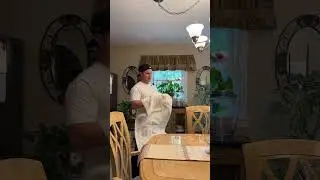 THE PIZZA GUY WHEN HE COMES OVER TO THE TABLE