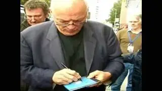 David Gilmour of Pink Floyd signing autographs in Oakland
