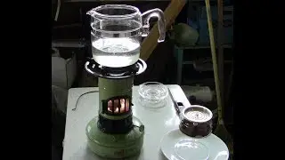 Making coffee with a vintage Pyrex percolator and a 1960s British Valor Kerosene stove.