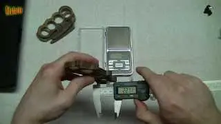 Brass knuckles made of textolite. Weight and dimensions.