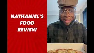 Nathaniel tries food in Buffalo,NY