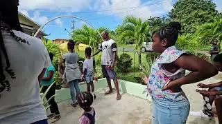 BK 3. TT.  Children, learning to share at the "CP's Bird Sanctuary"  in  🕯️Tobago, WI🕯️