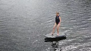 My wife cruising with a Waydoo Flyer One e-foil