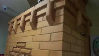 Отопительная печь с декоративным панно