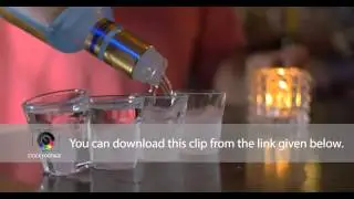 Barman pouring alcohol