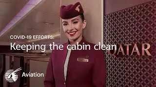 Cleaning the aircraft cabin interiors of a Qatar Airways aircraft