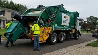 Waste Management - Roaring Peterbilt 320 / McNeilus rear load garbage truck