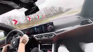 BMW M3 drifting on wet