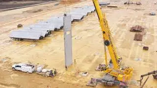 Crane Lifting Precast Concrete Panel for Warehouse Construction