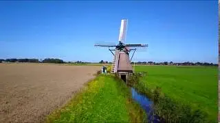 Windmill: De Eendracht, Kimswerd, Friesland, The Netherlands.. from above by Drone