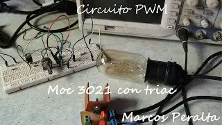 Ensayo de laboratorio. Prender una lámpara con MOC3021 y TRIAC. Circuito de PWM con LM555.