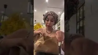 Cardi B on live enjoying some food while talking with her fans