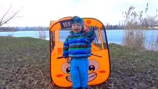 Dominika and little brothers play with baby dolls