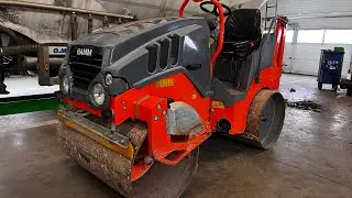 We bought a Hamm HD 10 Vibrating Roller and transported a container