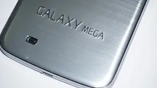 White Galaxy Mega 6.3 with metallic back cover