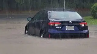 Never Drive Through Flooded Streets!