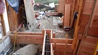 Veterans concrete,...progress @ grade beam iron work