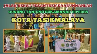 DRUMBAND LOKAL IRINGI JALAN SEHAT PESANTREN DAARUNNAHLAH CIPEDES KOTA TASIKMALAYA
