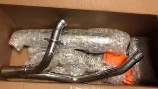 Removing the stock exhaust from an Indian Scout