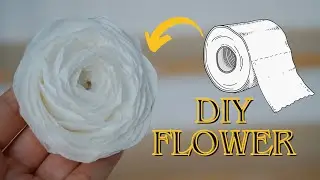 A little magic and toilet paper.  DIY paper napkin flower in 5 minutes.