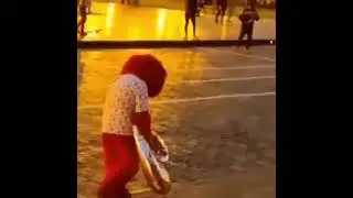 Sad Elmo walking down the street