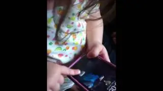 Baby knows how to work an iPhone