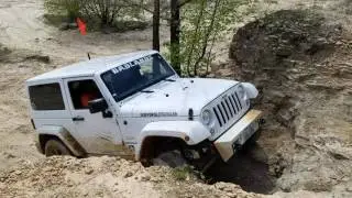 Rock crawling mostly stock Jeep Wrangler Sahara JK at Badlands Off Road Park No lockers!