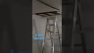 One man installation drywall on ceiling. Click below for more info.
