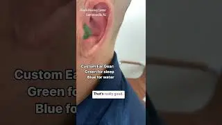 Custom ear gear: green for sleep, blue for water