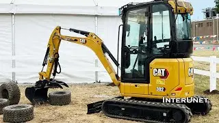 Remote controlled CAT 302 compact excavator demonstration