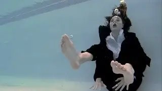 Business Woman Wakes Up Underwater Drowning