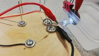 Transmitting sound via a blinking LED using two 2p coins solar cell