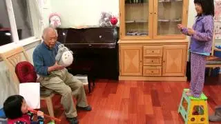 Dad singing with Sarah and Liz