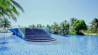 CaraWorld | Wyndham Grand KN Paradise Cam Ranh - Pools - Beach - Kids - Treatments