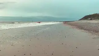 RNLI inshore lifeboat beaching at Cromer