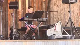 Piano Man take one 10 year old practice at the park event