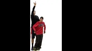 One handed basketball shots near half-court by Matt while assisting Daniel