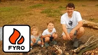 Outdoor cooking: Milk rice with berry sauce on a campfire
