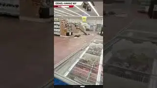 A large fragment of an intercepted rocket reportedly landed in a supermarket in Ashdod. #gaza
