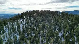 Aerial View Over Snowy Mountains in Pine Colorado