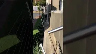 Waterproof between top of complex boundary wall and exterior house wall.