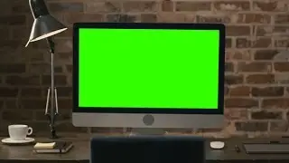 Computer Monitor with Green Screen on a Table | Stock Footage - Videohive