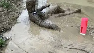 Winter jacket and snowpants getting a bit muddy.