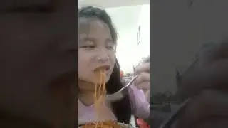 eating spaghetti